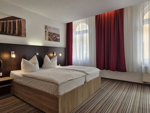 Imagen de la habitación del Pension bei der Marienkirche. Foto 9