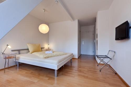Imagen de la habitación del Pensionsieben Das Andere Hotel. Foto 8