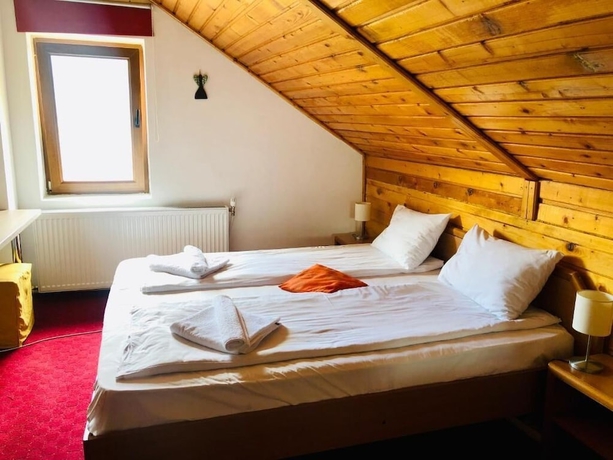 Imagen de la habitación del Pensiunea Kalinder, Bușteni. Foto 4