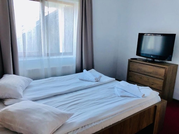 Imagen de la habitación del Pensiunea Kalinder, Bușteni. Foto 13
