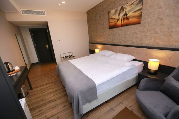 Imagen de la habitación del Pentahor Hotel. Foto 9