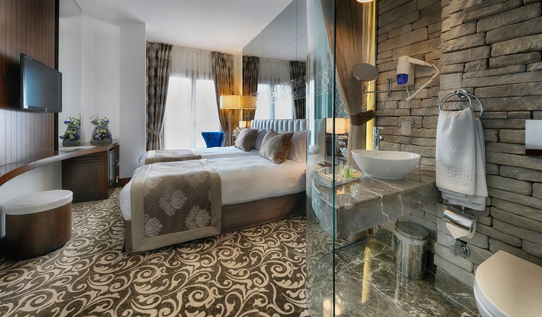 Imagen de la habitación del Pera Center Hotel. Foto 10