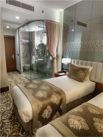 Imagen de la habitación del Pera Center Hotel. Foto 11