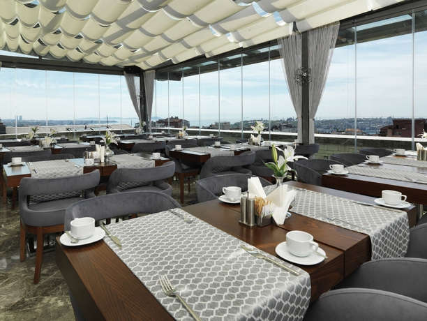 Imagen del bar/restaurante del Pera Center Hotel. Foto 6