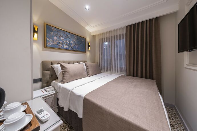 Imagen de la habitación del Pera Luna Premium. Foto 18