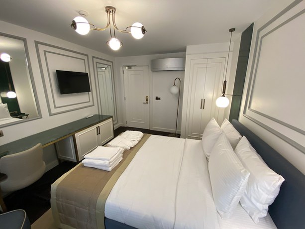 Imagen de la habitación del Pera Rasso Hotel Boutique Hotel. Foto 3