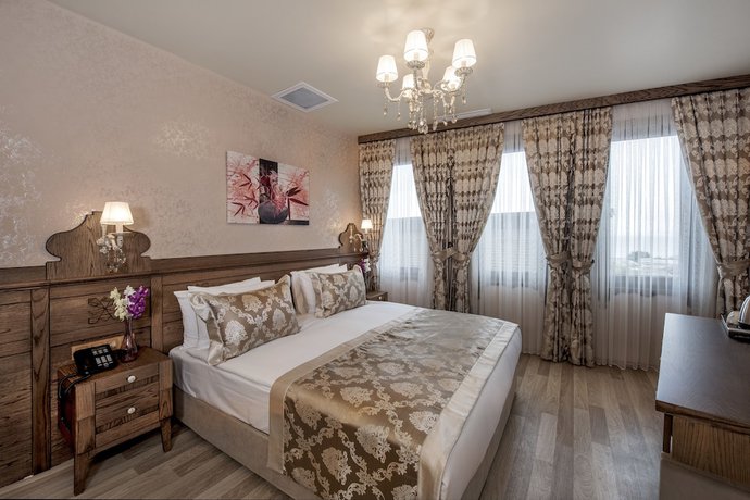 Imagen de la habitación del Perapolis Hotel. Foto 3