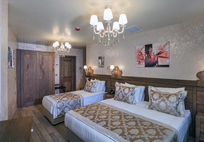Imagen de la habitación del Perapolis Hotel. Foto 8