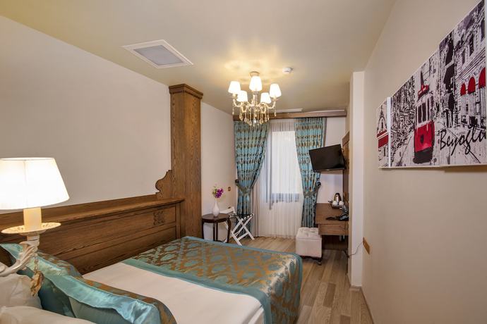Imagen de la habitación del Perapolis Hotel. Foto 11
