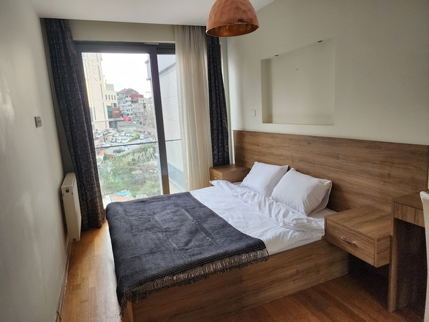 Imagen de la habitación del Perfect Residence Taksim. Foto 17