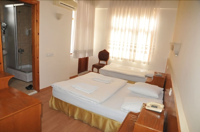 Imagen de la habitación del Perlo Hotel City. Foto 4