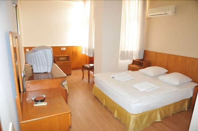 Imagen de la habitación del Perlo Hotel City. Foto 6