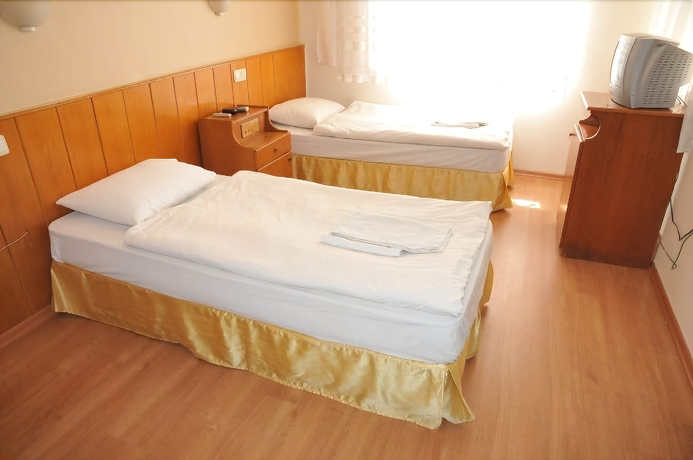 Imagen de la habitación del Perlo Hotel City. Foto 7