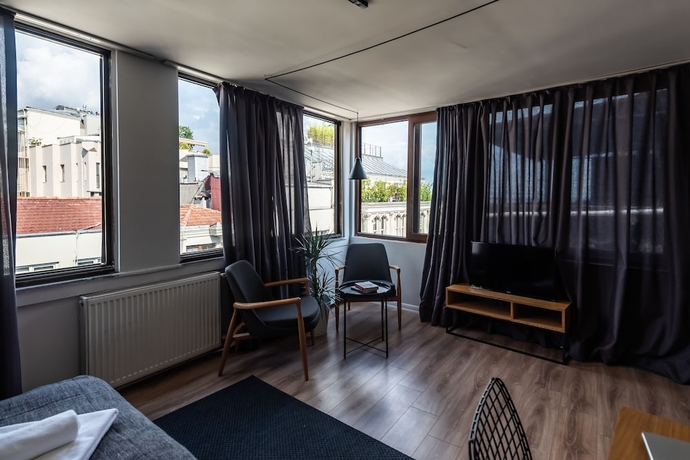 Imagen de la habitación del Pesa Suites. Foto 1