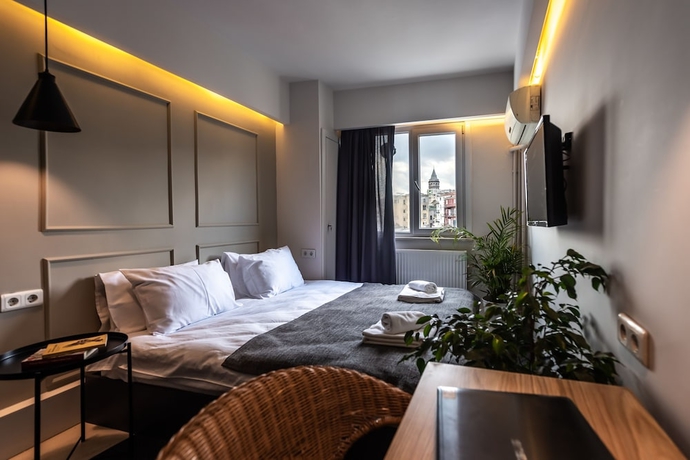 Imagen de la habitación del Pesa Suites. Foto 7