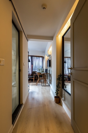 Imagen de la habitación del Pesa Suites. Foto 10