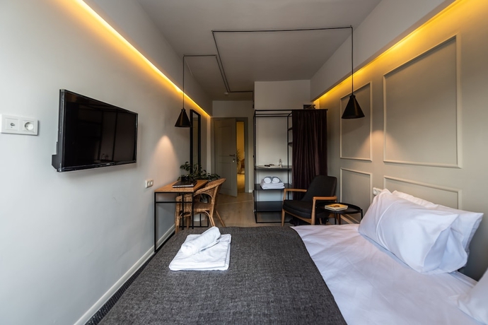 Imagen de la habitación del Pesa Suites. Foto 11