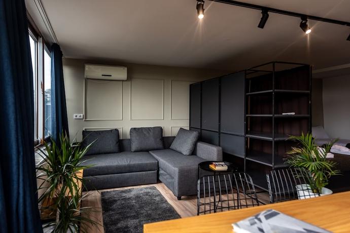 Imagen de la habitación del Pesa Suites. Foto 15