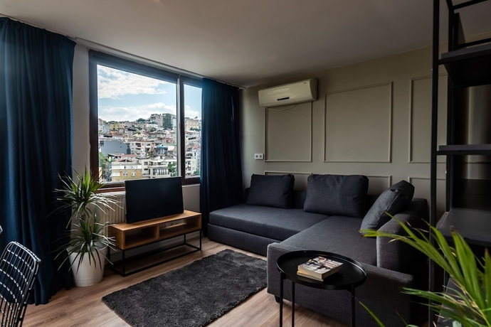Imagen de la habitación del Pesa Suites. Foto 16