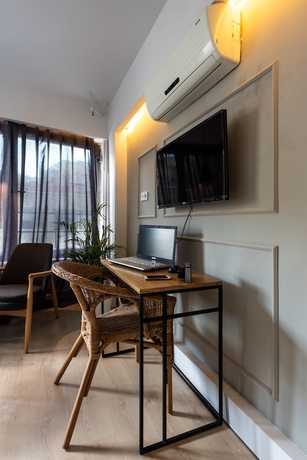 Imagen de la habitación del Pesa Suites. Foto 19