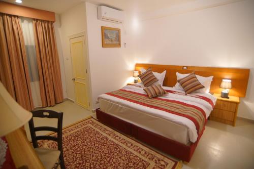 Imagen de la habitación del Petra Plaza Hotel. Foto 6