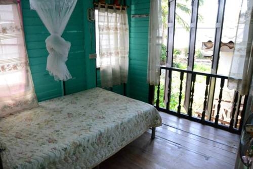 Imagen general del Phiman Riverview Guesthouse. Foto 6