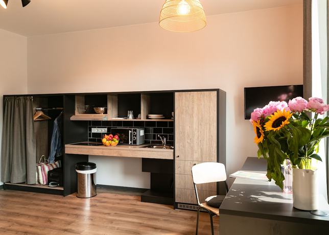 Imagen de la habitación del Phnx Aparthotel Hamburg. Foto 7