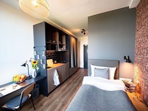 Imagen de la habitación del Phnx Aparthotel Hamburg. Foto 8