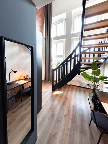 Imagen de la habitación del Phnx Aparthotel Hamburg. Foto 18