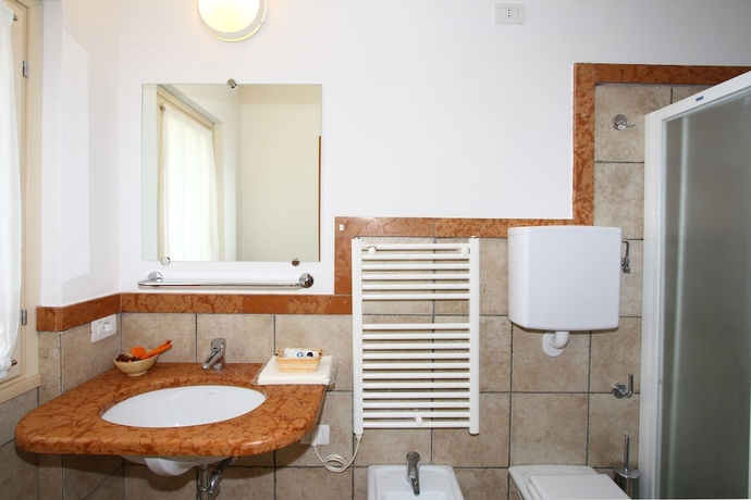 Imagen de la habitación del Piani di Clodia. Foto 16