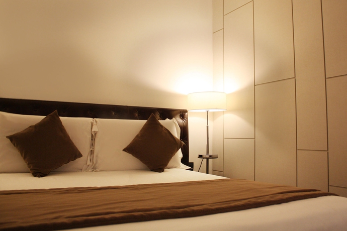 Imagen de la habitación del Piazza Del Gesù Luxury Suites. Foto 3