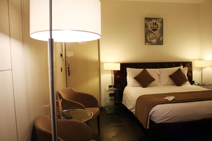 Imagen de la habitación del Piazza Del Gesù Luxury Suites. Foto 6