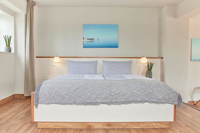 Imagen de la habitación del Pierspeicher Boardinghouse. Foto 3