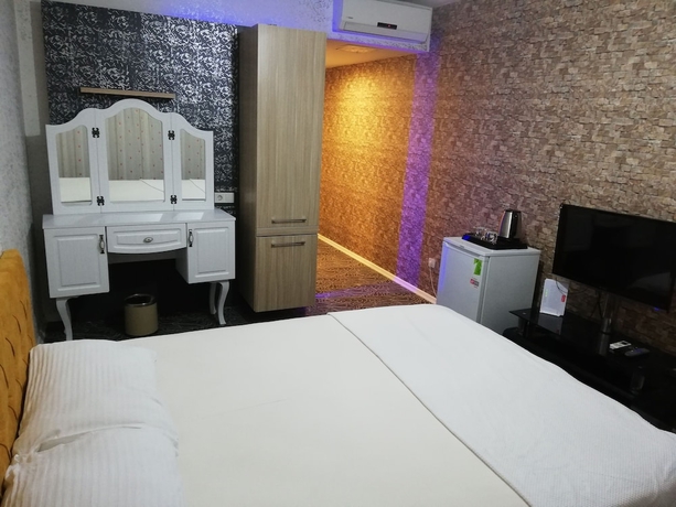 Imagen de la habitación del Pin Suites. Foto 4