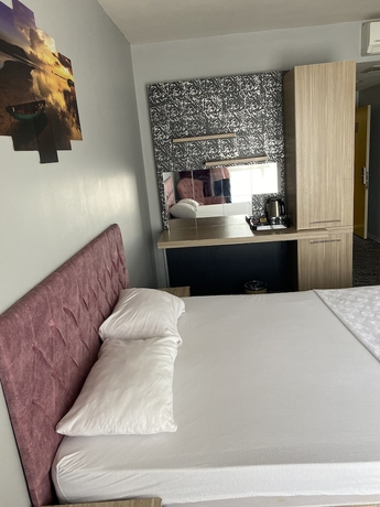 Imagen de la habitación del Pin Suites. Foto 11