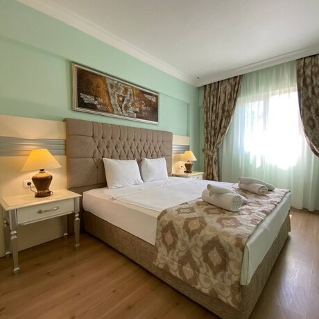 Imagen de la habitación del Pine Villas And Apartments Kusadasi. Foto 16
