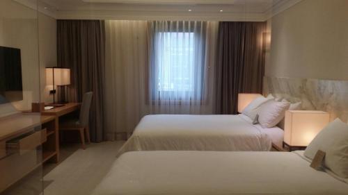 Imagen de la habitación del Pinegrove Hotel. Foto 10