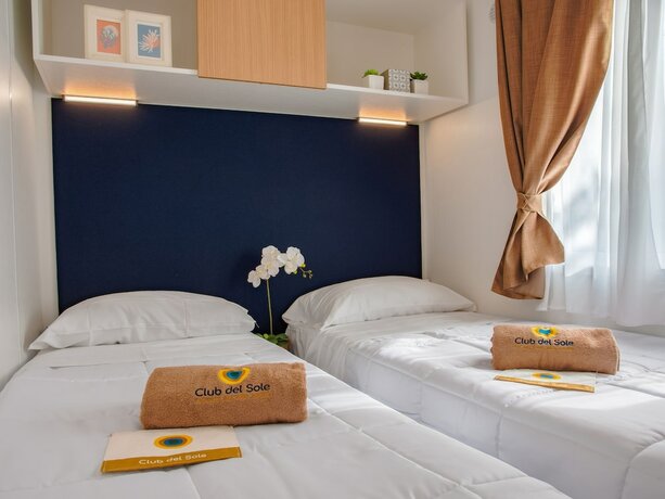 Imagen de la habitación del Pineta Beach Village. Foto 16