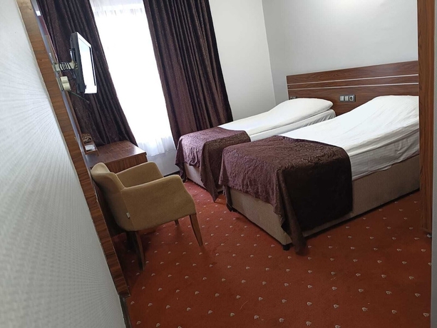 Imagen de la habitación del Pirotel Hotel. Foto 17