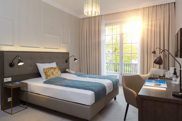 Imagen de la habitación del Pk Parkhotel Kurhaus. Foto 14