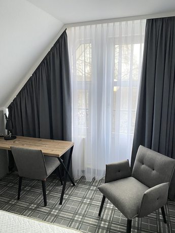 Imagen de la habitación del Platzhirsch Hotel. Foto 7