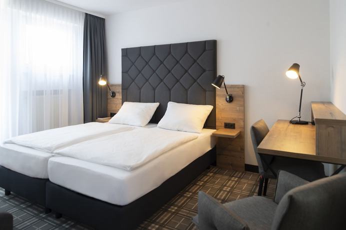Imagen de la habitación del Platzhirsch Hotel. Foto 9