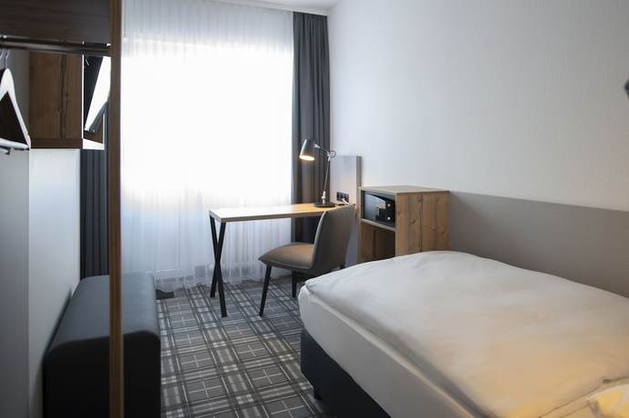Imagen de la habitación del Platzhirsch Hotel. Foto 10