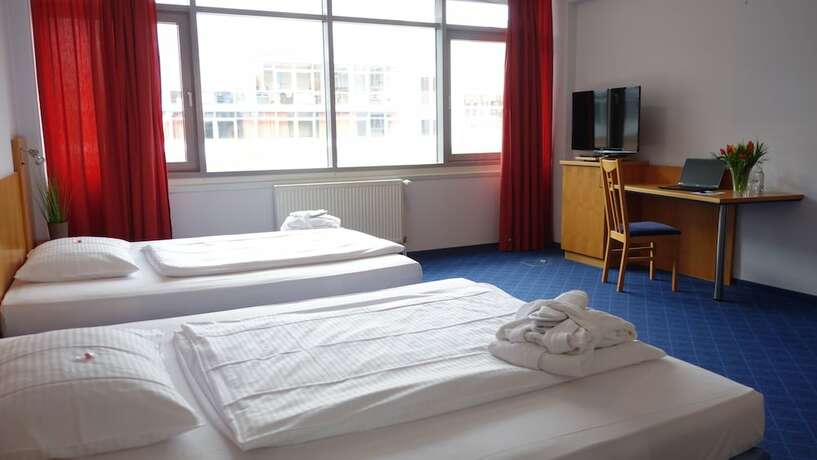 Imagen de la habitación del Plaza Inn Braunschweig City Nord. Foto 17