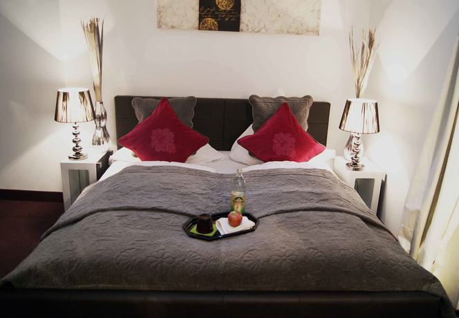 Imagen de la habitación del Plenus Hotel. Foto 9