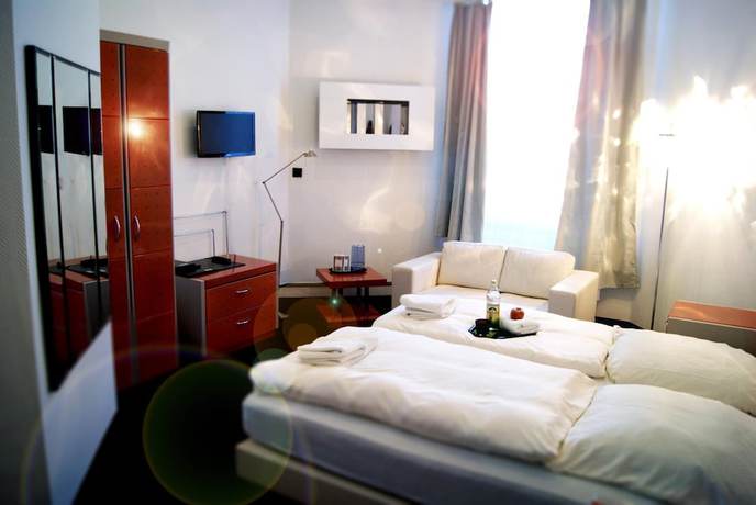 Imagen de la habitación del Plenus Hotel. Foto 10