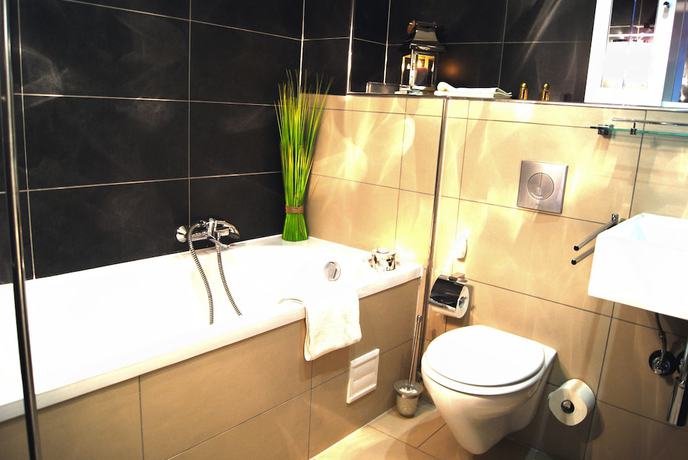 Imagen de la habitación del Plenus Hotel. Foto 11