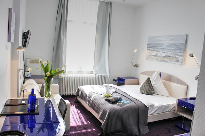 Imagen de la habitación del Plenus Hotel. Foto 18
