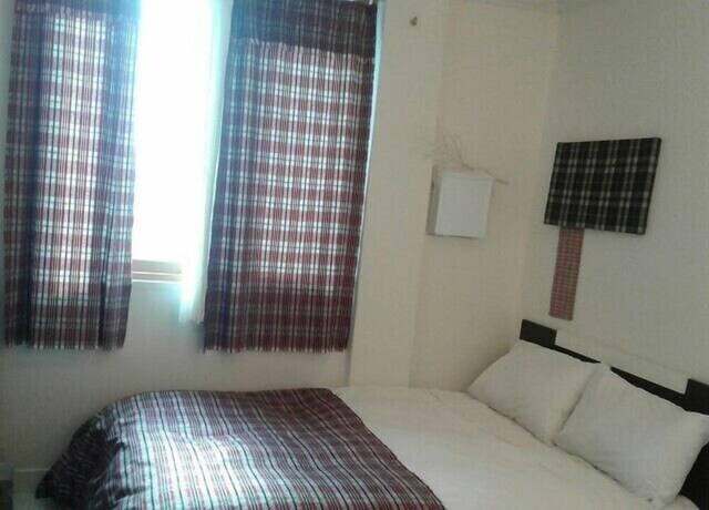 Imagen de la habitación del Pohang Youngildae Guesthouse. Foto 14