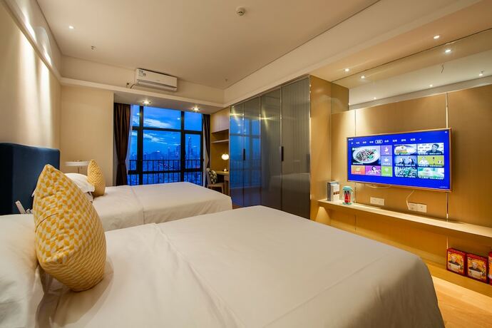 Imagen general del Poltton International Service Apartment Hesheng Palza Branch. Foto 6